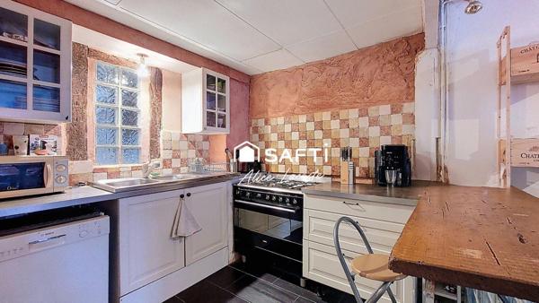 Maison atypique au cœur du village