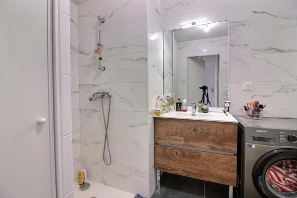 Appartement Lyon 4 pièces dans un immeuble très récent avec jardin terrasse et garage