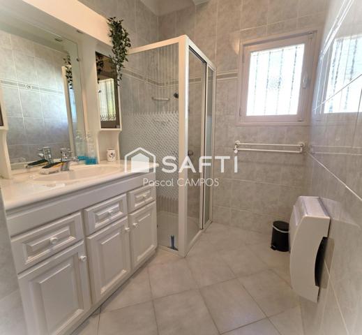 Maison 5 chambres avec garage et jardin au cœur du village