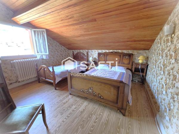 Maison 5 chambres avec garage et jardin au cœur du village