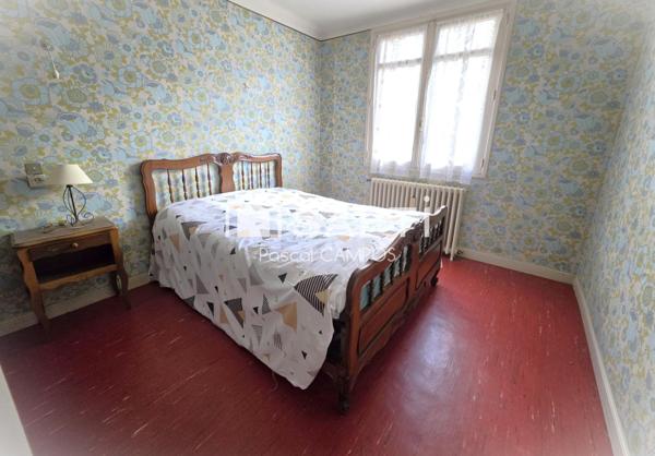 Maison 5 chambres avec garage et jardin au cœur du village