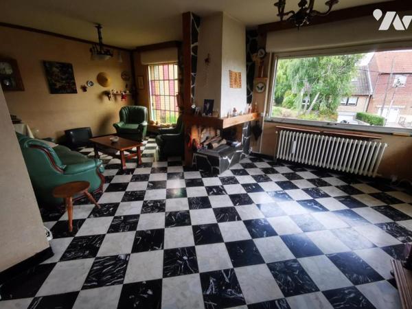 Maison semi-individuelle avec garage