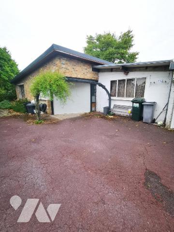 Maison semi-individuelle avec garage