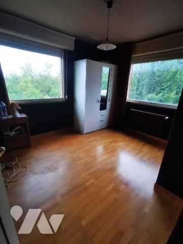 Maison semi-individuelle avec garage