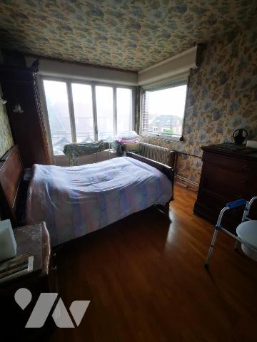 Maison semi-individuelle avec garage