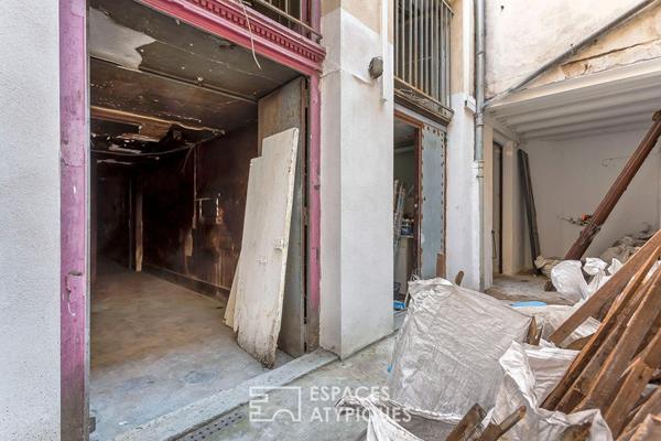 Loft en plateau à rénover avec cour privative