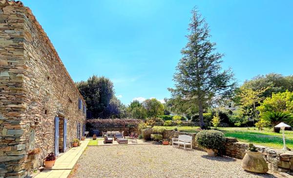 OLETTA – Propriété d’exception en pierre avec piscine et vaste terrain paysager