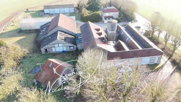 ENTREPÔTS ET MAISONS D'HABITATION SUR 2 HECTARES