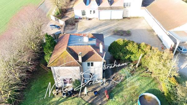 ENTREPÔTS ET MAISONS D'HABITATION SUR 2 HECTARES