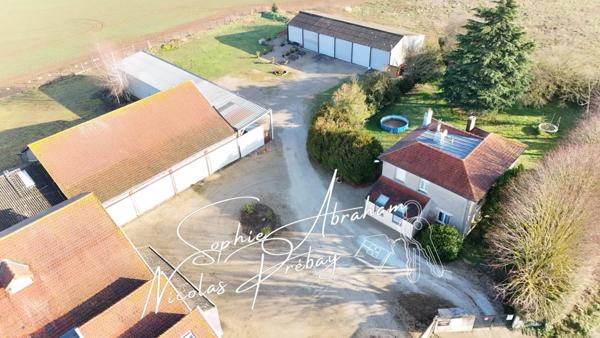 ENTREPÔTS ET MAISONS D'HABITATION SUR 2 HECTARES