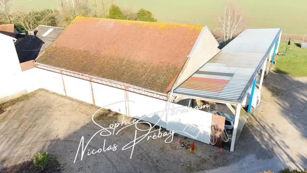 ENTREPÔTS ET MAISONS D'HABITATION SUR 2 HECTARES