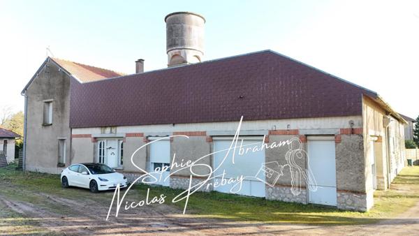 ENTREPÔTS ET MAISONS D'HABITATION SUR 2 HECTARES