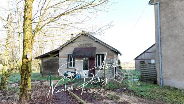 ENTREPÔTS ET MAISONS D'HABITATION SUR 2 HECTARES