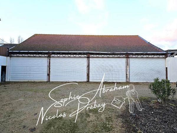 ENTREPÔTS ET MAISONS D'HABITATION SUR 2 HECTARES