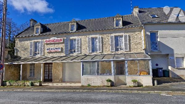 Un immeuble mixte à usage commercial et d'habitation :