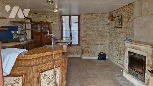 Un immeuble mixte à usage commercial et d'habitation :