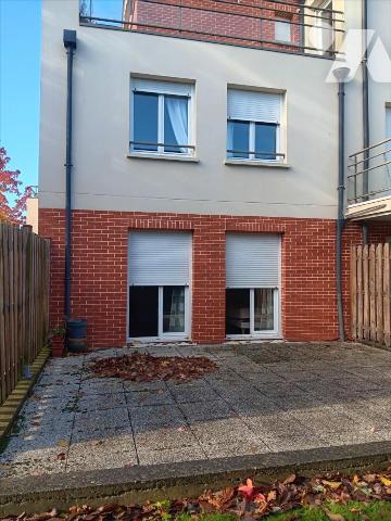 CENTRE VILLE APPARTEMENT F3 AVEC JARDIN PRIVATIF