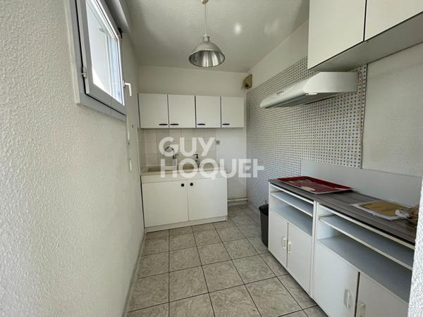 Appartement 3 pièces avec place de parking- Halles centre ville