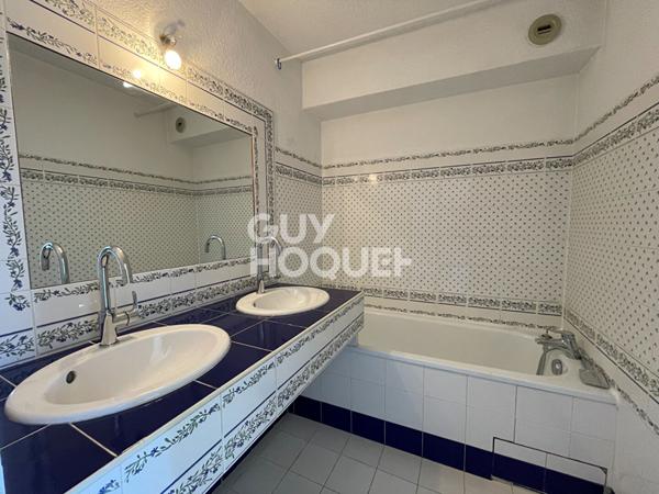 Appartement 3 pièces avec place de parking- Halles centre ville