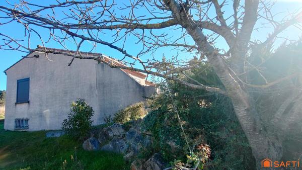 Maison de plein pied au calme avec grand sous sol