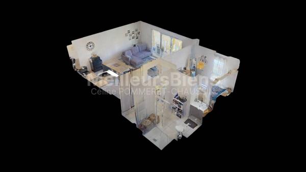 Appartement de 52m² avec un garage fermé.