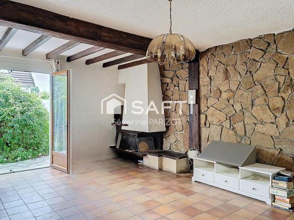 Maison avec garage et jardin - quartier centre ville