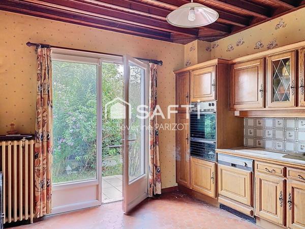 Maison avec garage et jardin - quartier centre ville