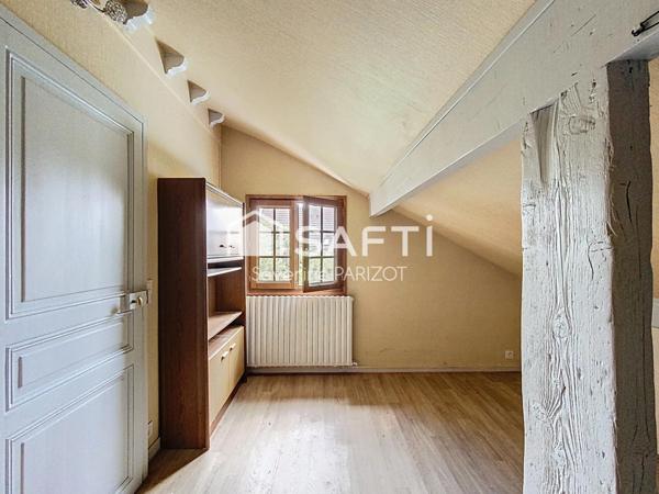 Maison avec garage et jardin - quartier centre ville