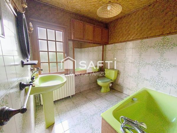 Maison avec garage et jardin - quartier centre ville