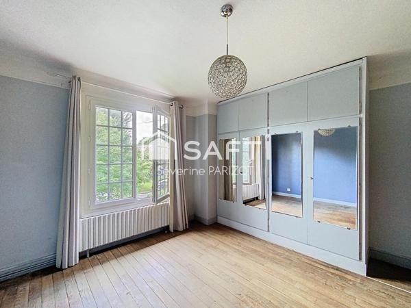 Maison avec garage et jardin - quartier centre ville