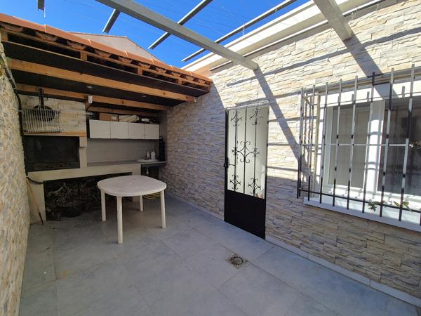 Maison plain pied avec cour et garage !