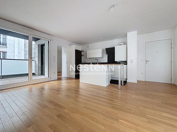 ISSY LES MOULINEAUX - AVENUE VICTOR CRESSON - Vente d'un appartement 3 pièces traversant avec balcon immeuble standing