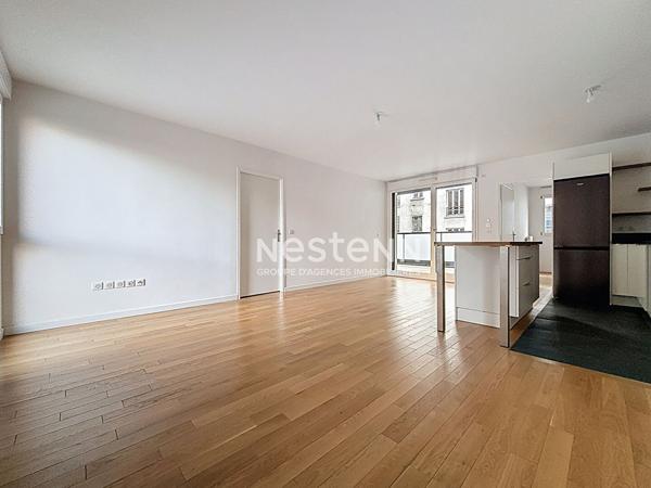 ISSY LES MOULINEAUX - AVENUE VICTOR CRESSON - Vente d'un appartement 3 pièces traversant avec balcon immeuble standing
