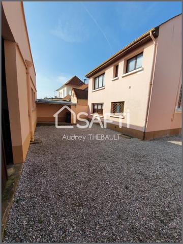 Immeuble de 2 appartements et un hangar