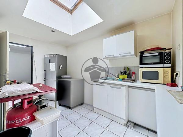 Vente                                                      Immeuble
                        
                     5 pièces                      105 m2                     à Saint-Quentin