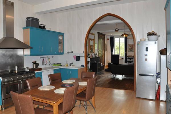 Belle maison de village avec activité commerciale au RDC