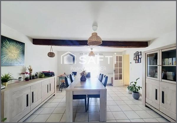 Maison de ville T5 avec garage, jardin et puits.