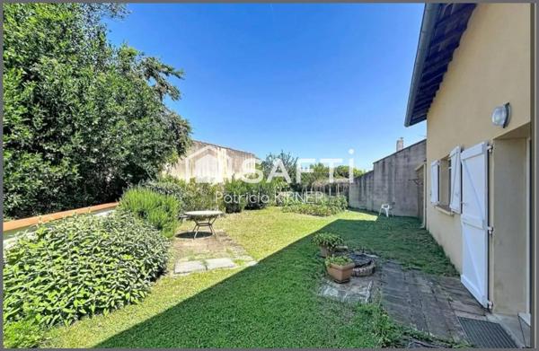 Maison de ville T5 avec garage, jardin et puits.