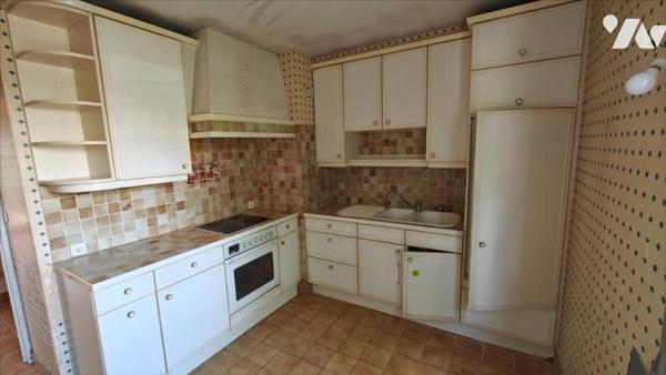 Besançon, Quartier Butte, Un appartement  T4 de 78 m² avec cave, garage et parking.