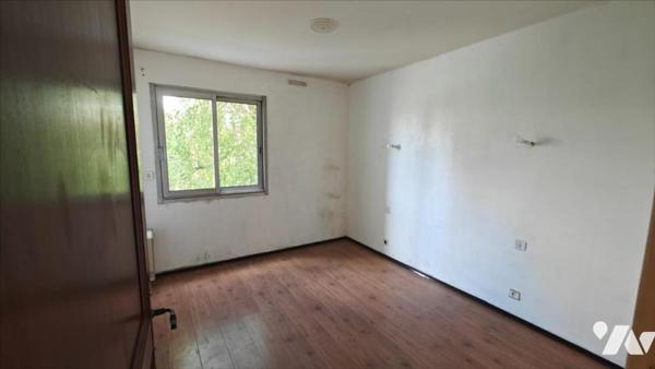 Besançon, Quartier Butte, Un appartement  T4 de 78 m² avec cave, garage et parking.