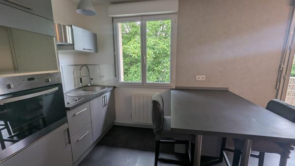 T2 avec balcon et stationnement