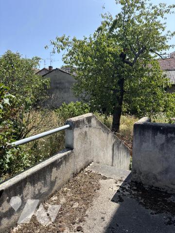 Maison en pierres et son terrain constructible