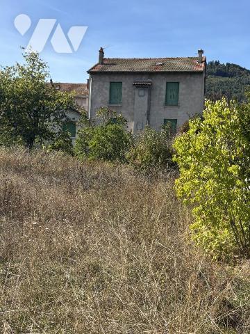Maison en pierres et son terrain constructible