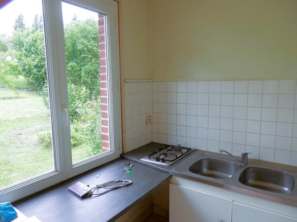 Maison ancienne en brique sur sous-sol plus Garage indépendant récent