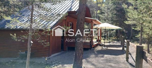 Chalet de 51m² sur 2 niveaux avec garages, vide sanitaire sur 552 m² de terrain cloturé