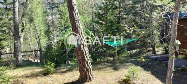 Chalet de 51m² sur 2 niveaux avec garages, vide sanitaire sur 552 m² de terrain cloturé