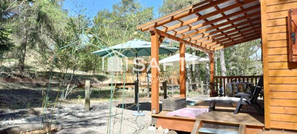 Chalet de 51m² sur 2 niveaux avec garages, vide sanitaire sur 552 m² de terrain cloturé