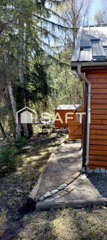 Chalet de 51m² sur 2 niveaux avec garages, vide sanitaire sur 552 m² de terrain cloturé