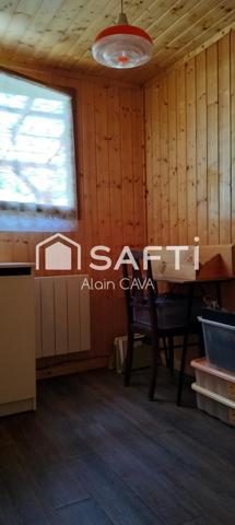 Chalet de 51m² sur 2 niveaux avec garages, vide sanitaire sur 552 m² de terrain cloturé