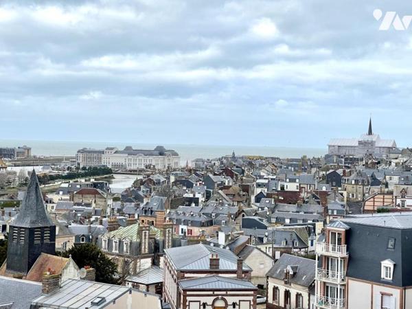 Dans Résidence sécurisée avec ascenseur et place de parking sécurisée en sous-sol 